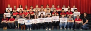 Bridgetown band and orchestra students hold up thank you signs